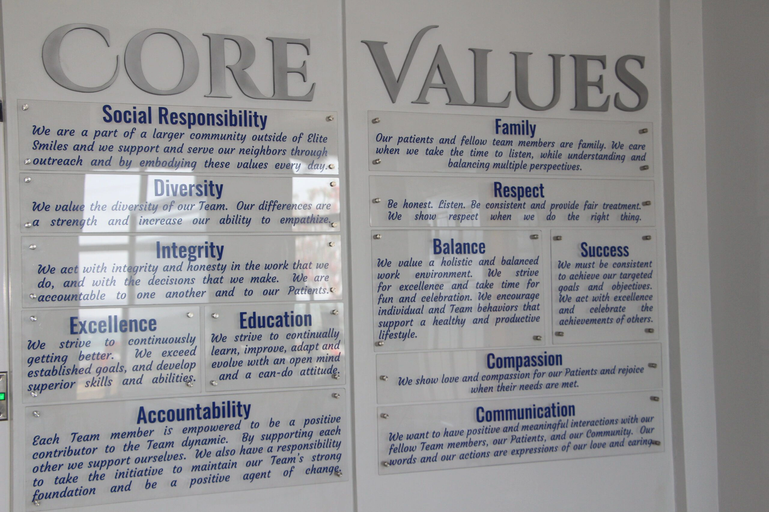 The Elite Smiles core values displayed inside the practice