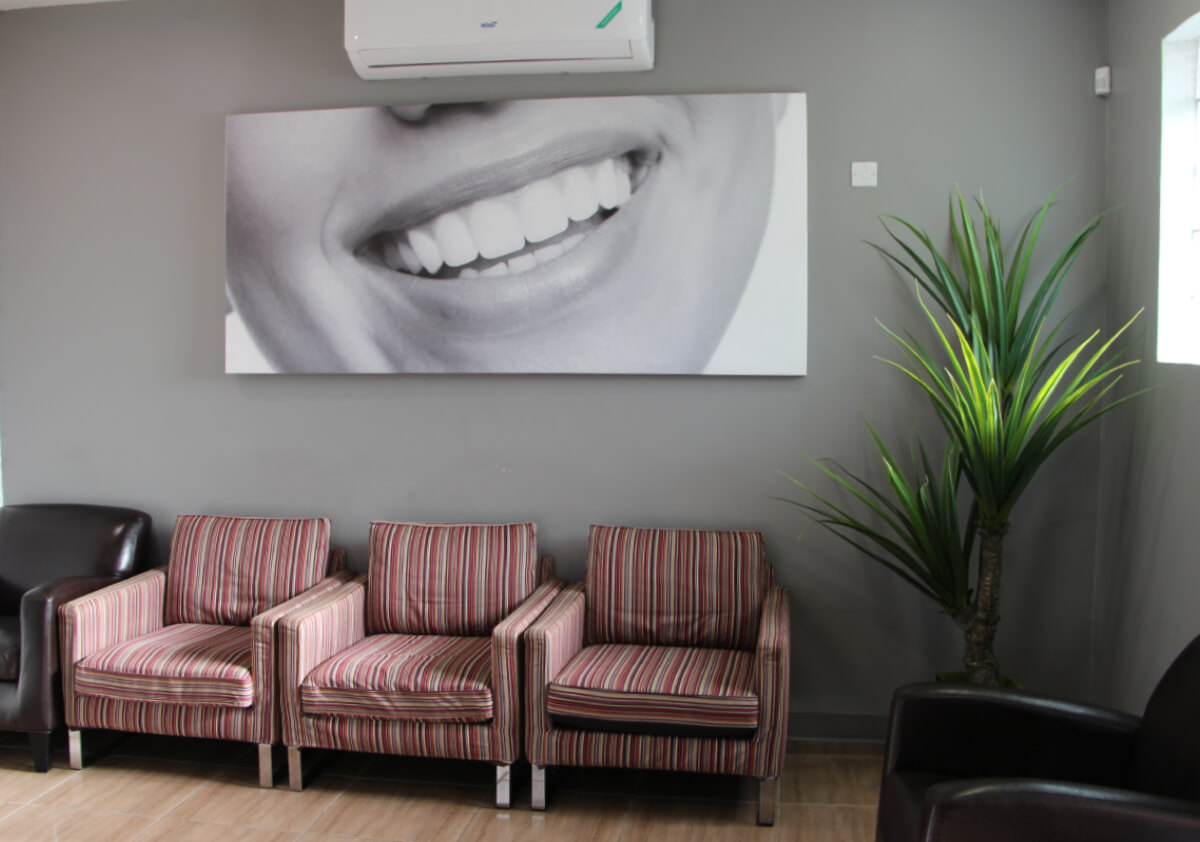 Elite Smiles dental office with smiling painting